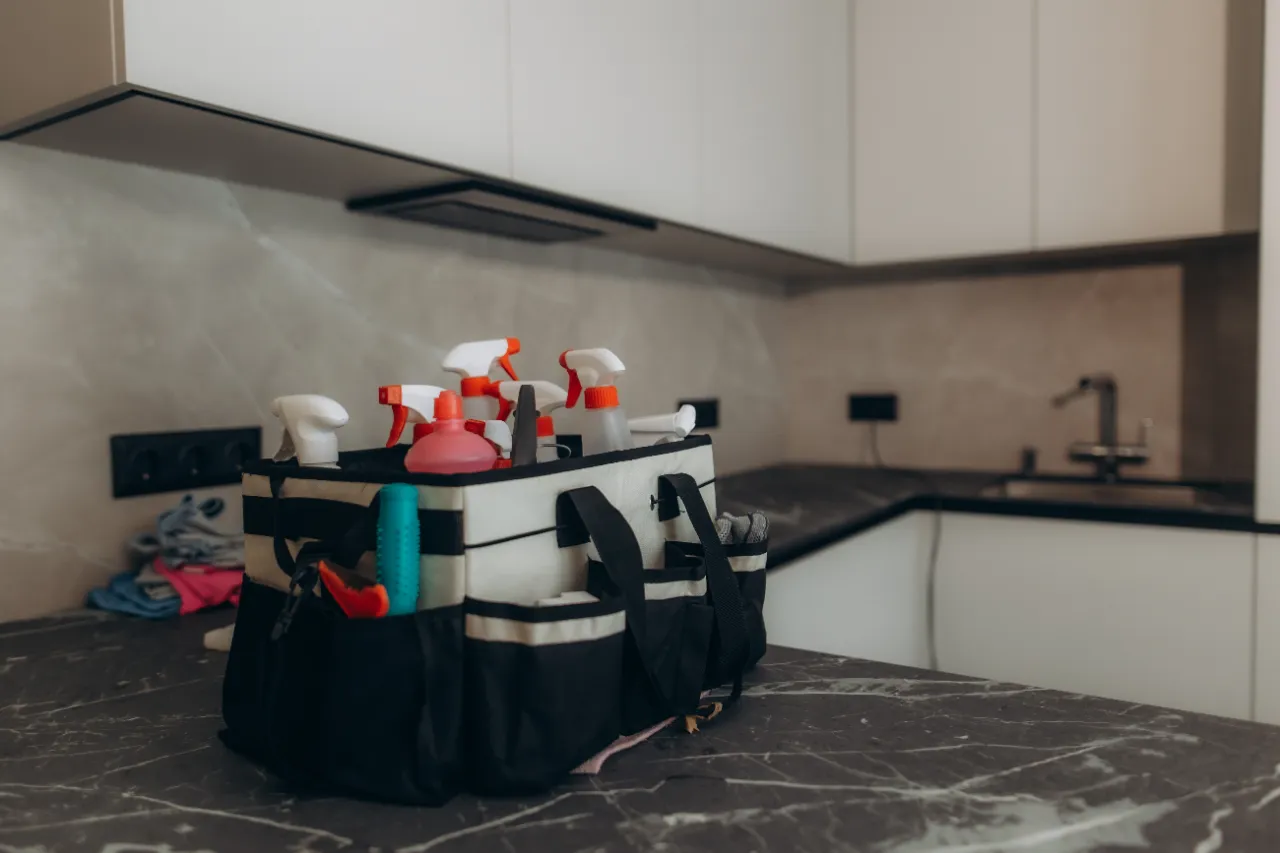 Cleaning supplies for a move-out cleaning in a New York apartment