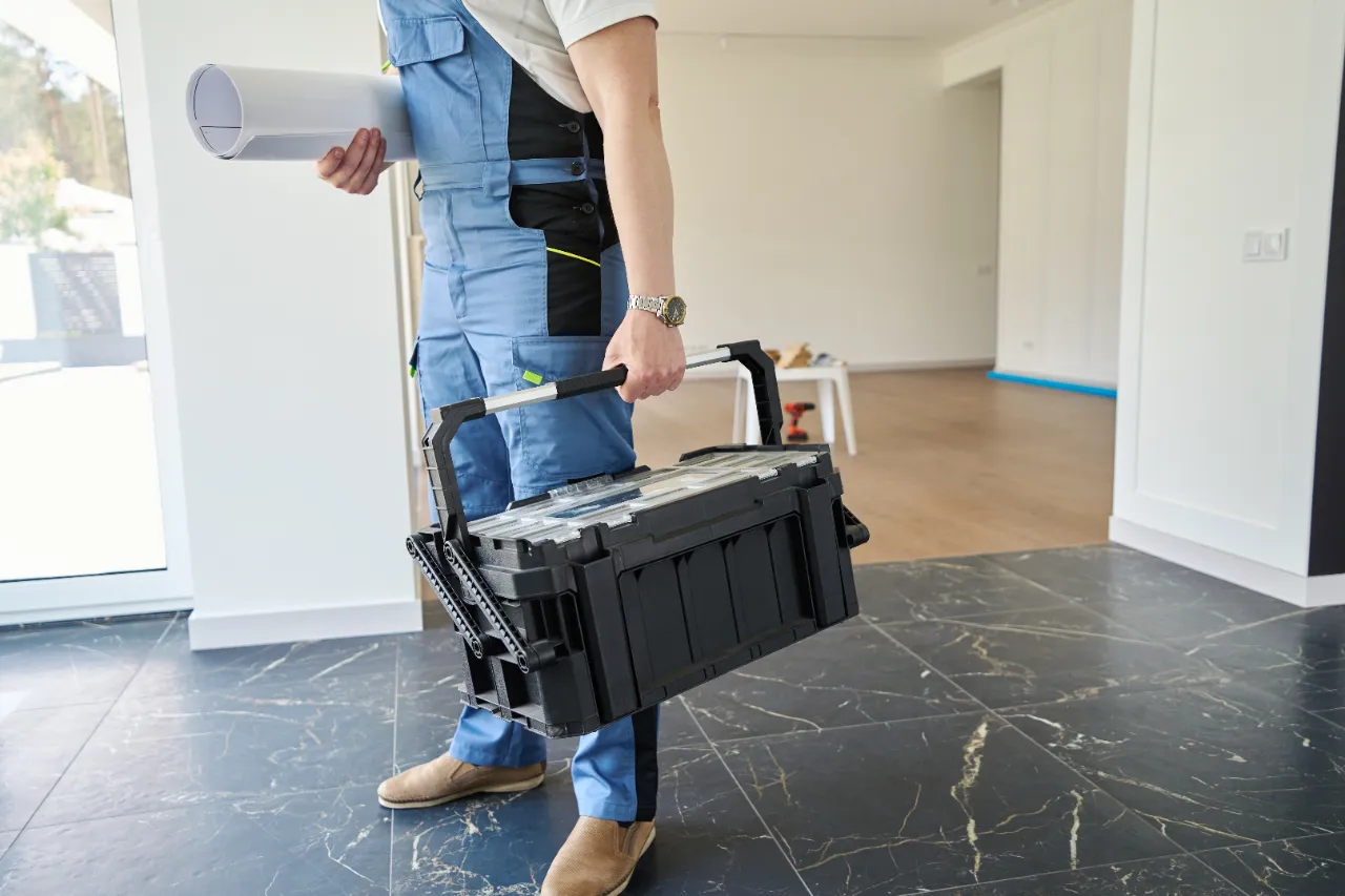 Maintenance technician preparing an empty apartment in New York