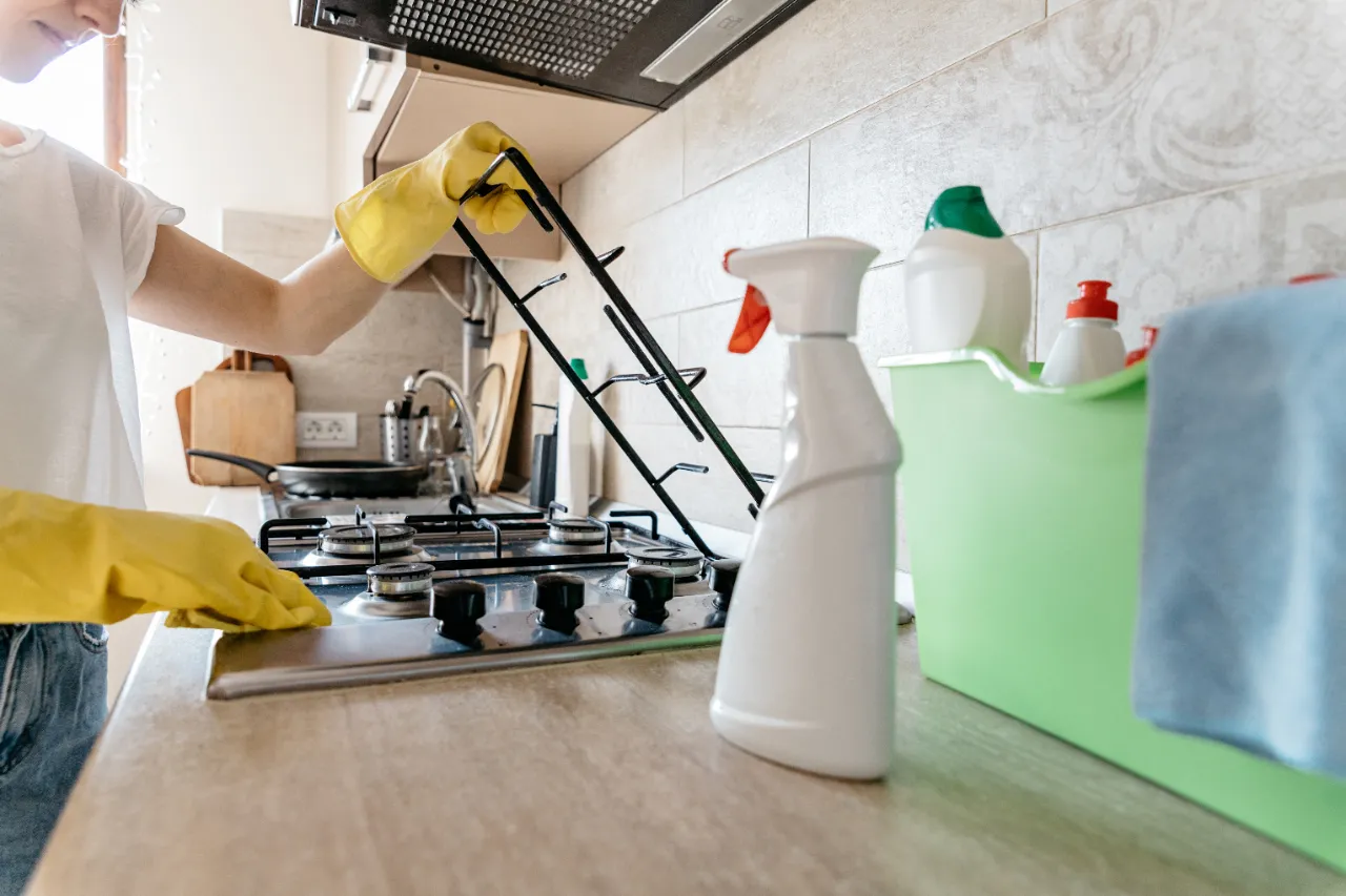 Stove top cleaning in a New York apartment
